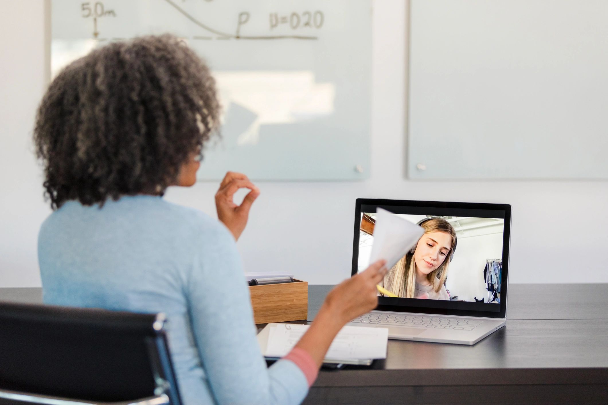 online tutoring session student teacher laptop